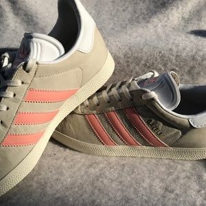 Pink, grey, and white Adidas Gazelles